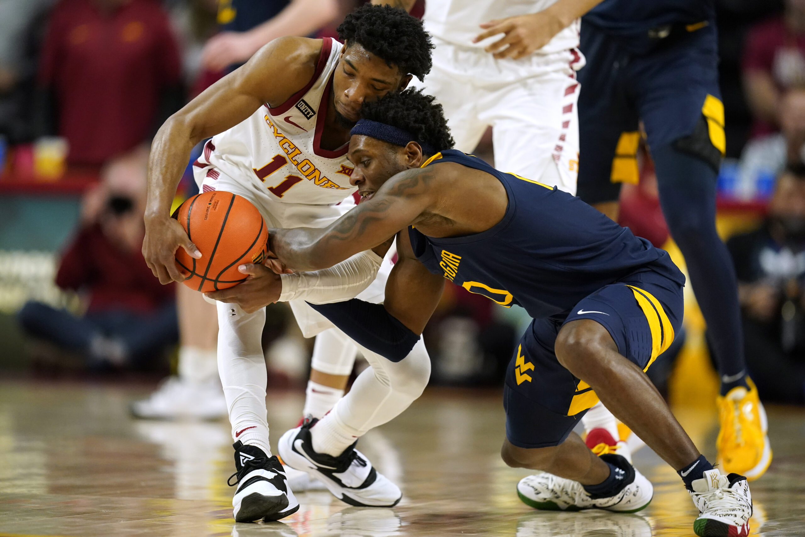 NOTEBOOK: WVU goes without starting point guard Kedrian Johnson against Iowa State